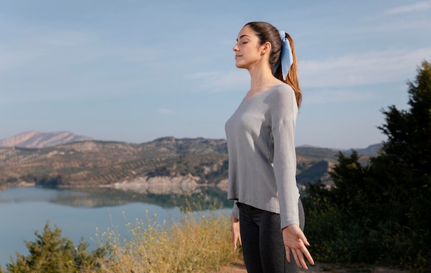 Woman Meditating in Nature – Free Stock Photo for Download