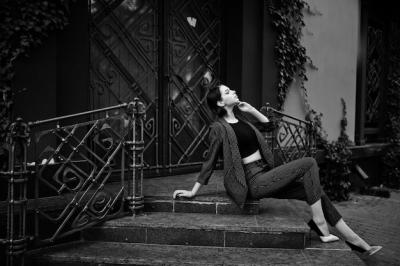 A Tall Leggy Young Beautiful Model in Formal Wear Posed on Stairs – Free Stock Photo for Download