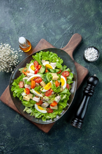 Delicious Salad with Fresh Ingredients on Wooden Cutting Board – Free Download