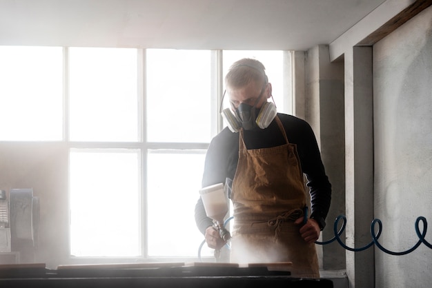 Young Male in a Wood Engraving Workshop – Free Stock Photo for Download