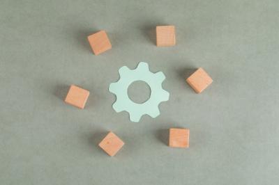 Wooden Cubes Representing Repair Concept on Grey Table – Free Download