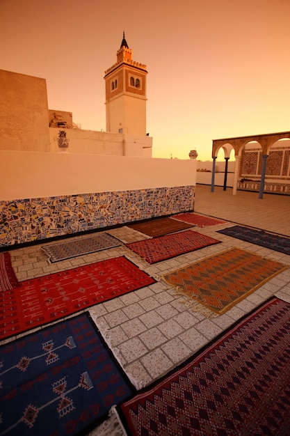 Stunning Sunset View of a Temple Building Against the Sky – Free Download