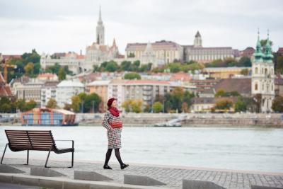 A Stylish Girl Walking by the Embankment of Budapest â Free Stock Photo for Download