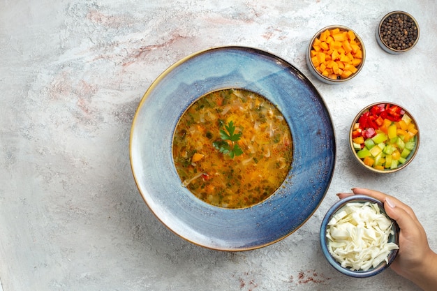 Delicious Hot Vegetable Soup in a Plate on a Light Background – Free Download