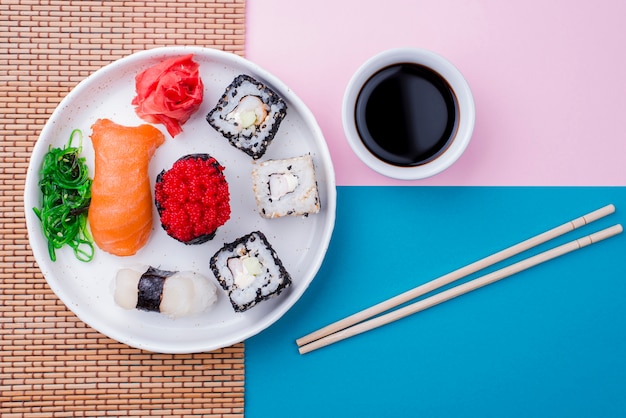 Flat Lay of Soya Sauce and Sushi – Free Stock Photo for Download