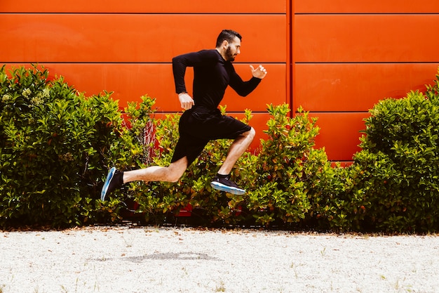 Side View of an Athlete Performing a Long Jump – Free Stock Photo, Download for Free