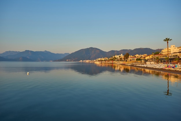 Calm Sea Reflecting Mountain Sunrise – Free Stock Photo for Download