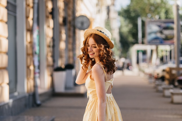 Stunning Outdoor Photos of Young Women in Yellow Dress and Hat – Free Download