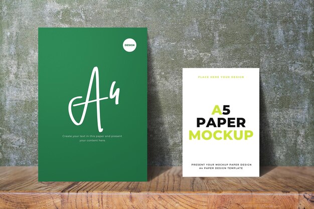 Green A4 Paper and A5 White Paper Mockup on Wood Surface – Free Download