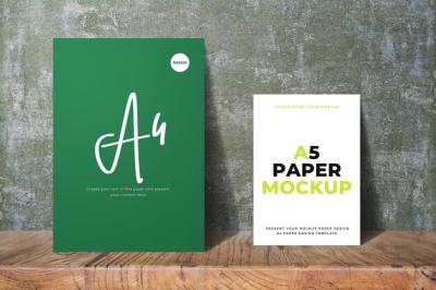 Green A4 Paper and A5 White Paper Mockup on Wood Surface – Free Download