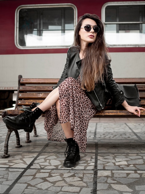 Woman Sitting on a Bench at a Train Station – Free Stock Photo, Download Free