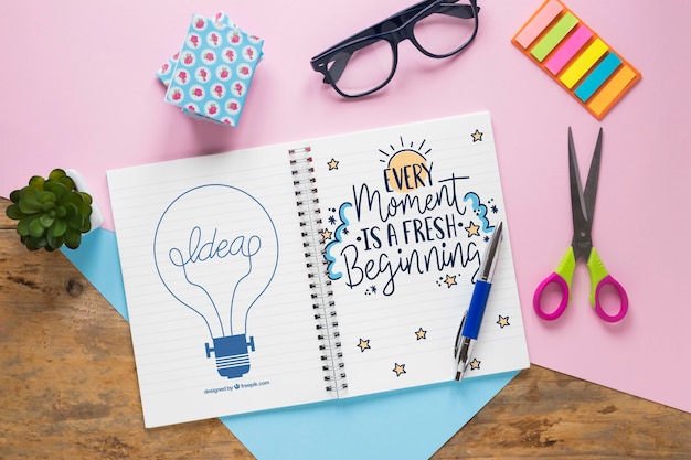 Motivational Message with Glasses, Scissors, and Notebook – Free Download