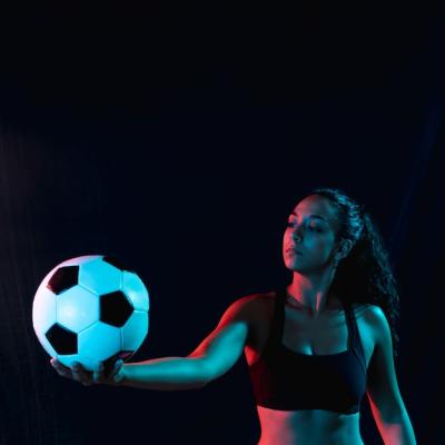 Young Woman Holding Soccer Ball – Free Download