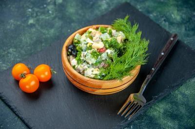 Vegetable Salad with Greens and Garlic on a Dark Blue Background – Free Download