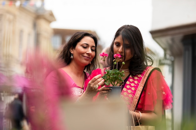 Women Smelling Flowers – Free Stock Photo for Download