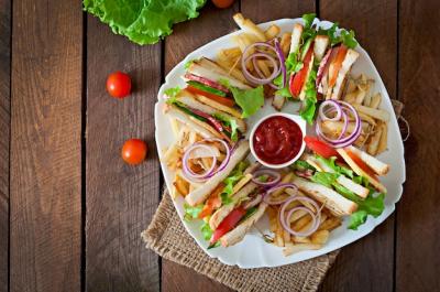 Delicious Club Sandwich with Cheese, Cucumber, Tomato, Smoked Meat, and Salami – Free Download