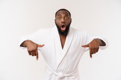 Black Guy in Bathrobe Expressing Surprise and Happiness – Free Download