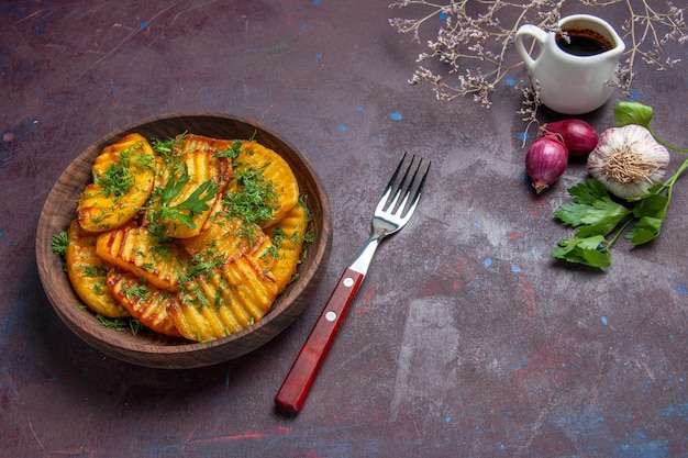 Delicious Top View of Cooked Potatoes with Greens on a Dark Surface – Free Stock Photo for Download