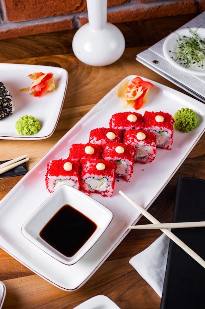 Sushi Rolls with Tobiko Caviar and Accompaniments – Free Stock Photo for Download