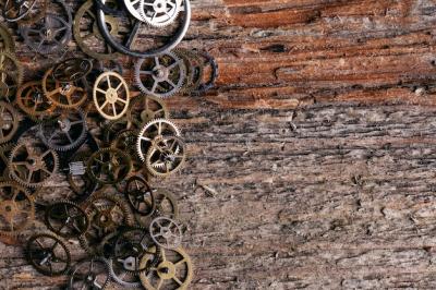 Gears on Wooden Table Background – Free Download