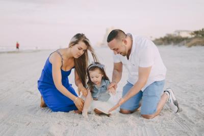 Beautiful Family on the Beach – Free Stock Photo for Download