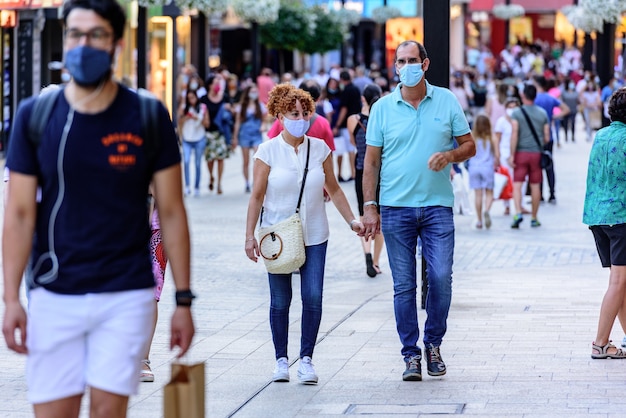 People Walking on Meritxell Commercial Street Post-COVID19 – Free Download