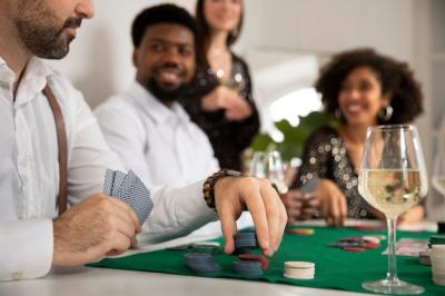 Friends Enjoying a Poker Game – Free Download