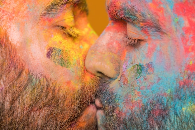 Kissing Couple of Rainbow Painted Homosexual Men – Free Stock Photo for Download