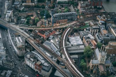 Aerial Shot of an Urban City at Sunrise – Download Free Stock Photo