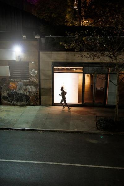 Nighttime Urban Running: Free Download of Young Man in City Streets