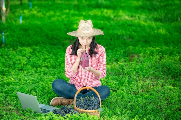 A Grape Farmer Enjoying Freshly Squeezed Grape Juice – Free Stock Photo for Download