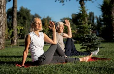 Older Couple Practicing Yoga Outdoors – Free Stock Photo for Download