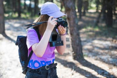 Faceless Woman Capturing Nature Amidst Forest â Free Download