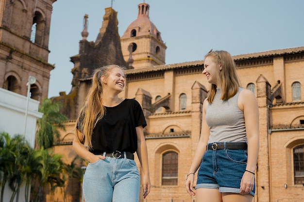 Young Female Friends at Santa Cruz de la Sierra Cathedral – Free Download