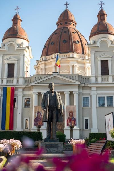 Church of the Annunciation and Statue of Emil Dandea in Targu Mures, Romania – Free Download