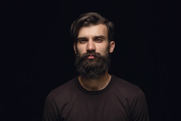 Close-Up Portrait of a Young Man Expressing Real Emotions