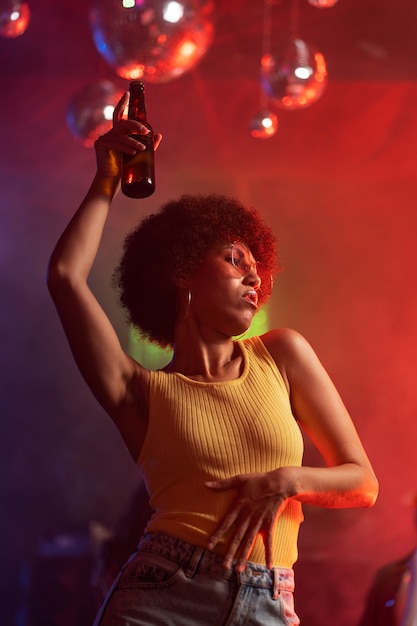 Young Woman Dancing at Techno Party – Free Stock Photo for Download