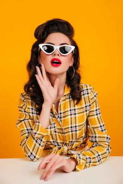 Charming Brown-Haired Lady in Checkered Shirt with Elegant Sunglasses – Free Stock Photo to Download