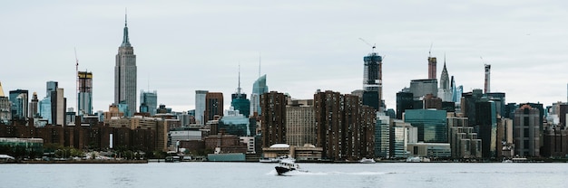 Ferry Boat on the East River with Stunning Manhattan Views – Free Download