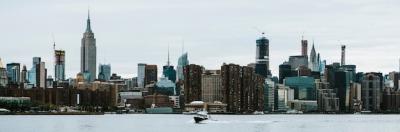 Ferry Boat on the East River with Stunning Manhattan Views – Free Download