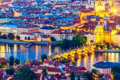 Aerial View of Illuminated Prague Featuring Charles Bridge – Free Download