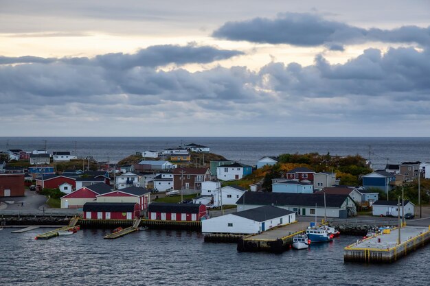 Cloudy Sunset Over Rocky Atlantic Ocean Coast Homes – Free Stock Photo, Download for Free