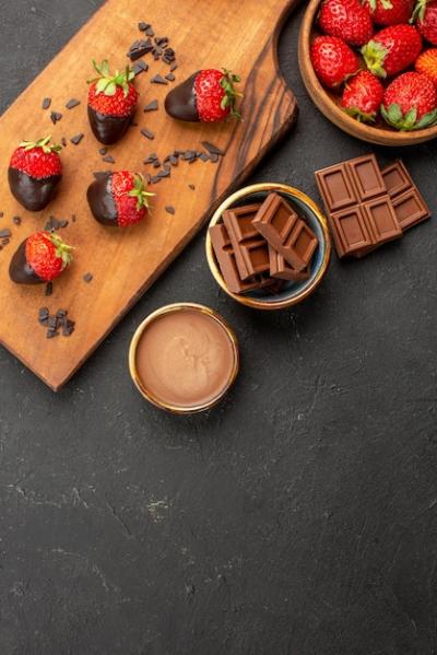 Strawberries and Chocolate Bars on Cutting Board – Free Download