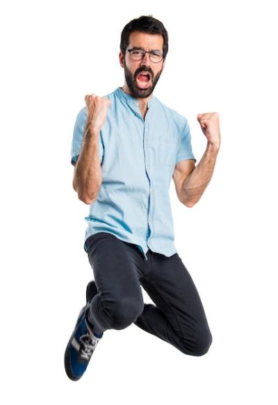 Handsome Man Jumping with Blue Glasses – Free Stock Photo for Download