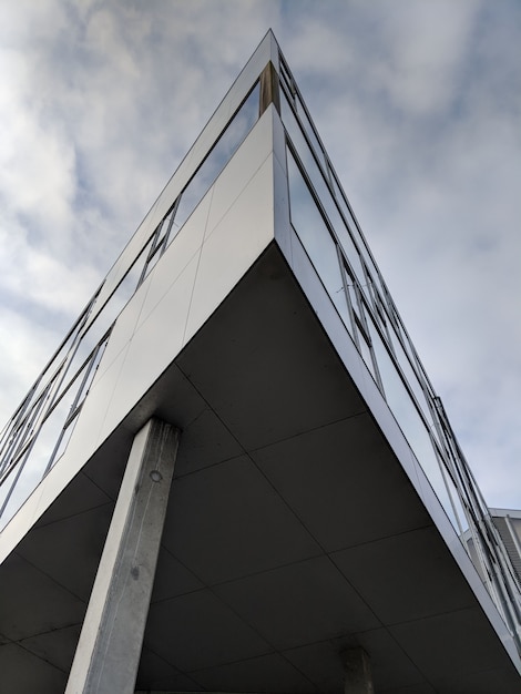 Vertical Low Angle View of a Triangular High-Rise Building – Free Stock Photo, Download for Free