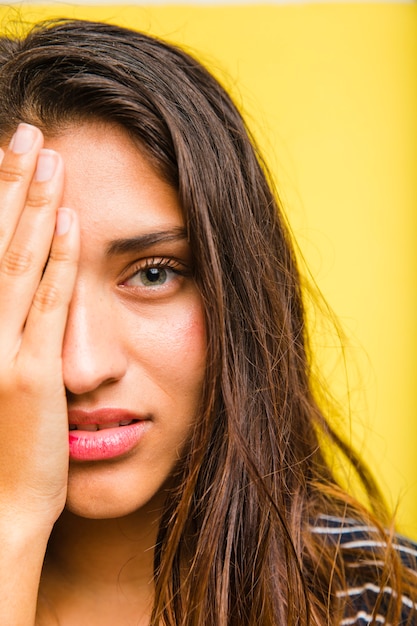 Brunette Girl Touching Her Face – Free Stock Photo, Download Free