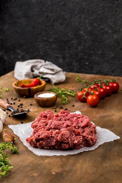 High Angle View of Meat with Tomatoes and Herbs – Free Download