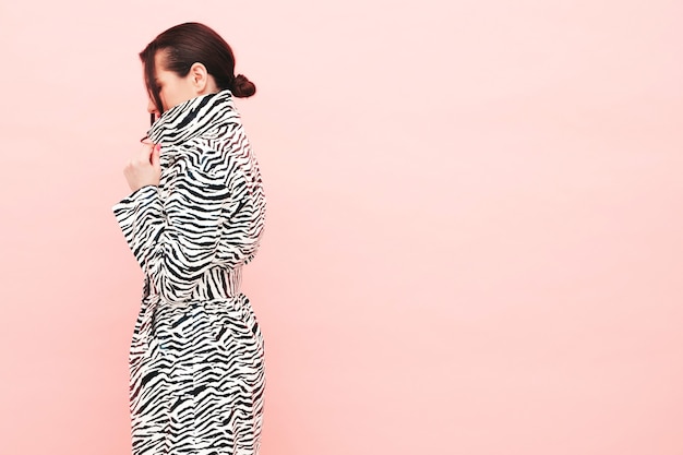 High Fashion Portrait of a Beautiful Young Brunette in a Trendy Zebra Coat – Free Download