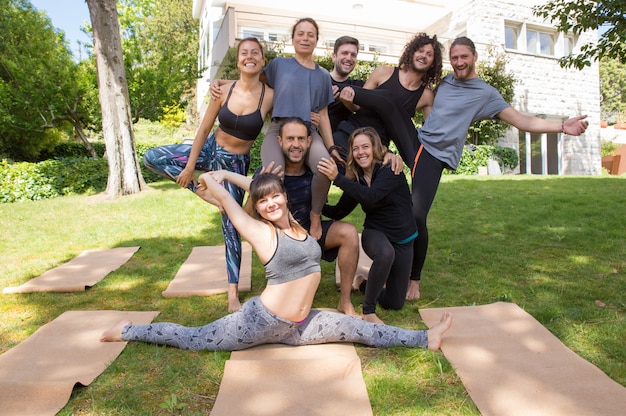 Cheerful Yoga Team Posing Outdoors – Free Download