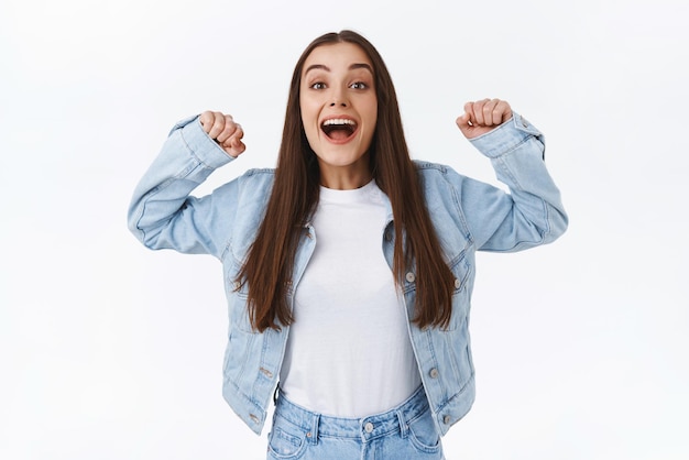 Brunette Woman Celebrating Success with Joyful Jumping – Free Stock Photos for Download